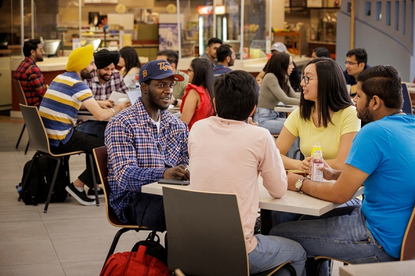 students around cafeteria table