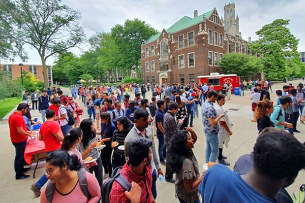 celebratory students crowd into the Student Courtyard