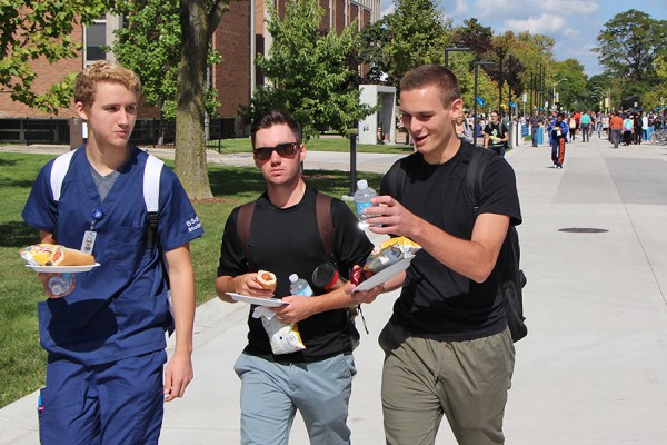 students walking on UWindsor campus