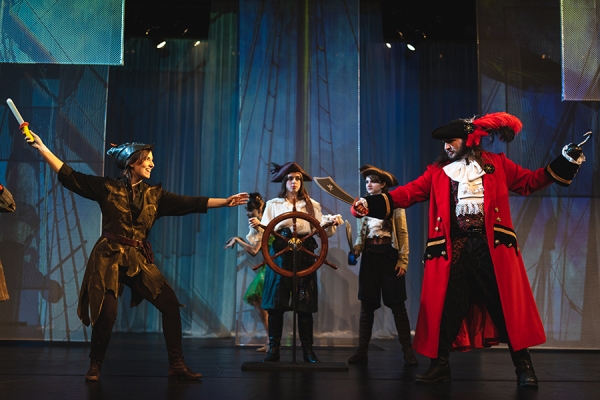 Annie Roberts as Peter Pan and Justin Mendler as Captain Hook spar in the University Players production of “Tinker Bell”