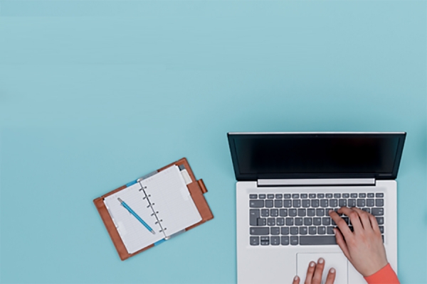 hand on laptop keyboard