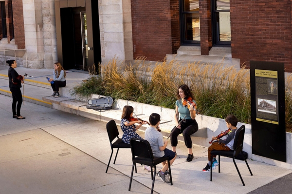 violin students outside SoCA Armouries