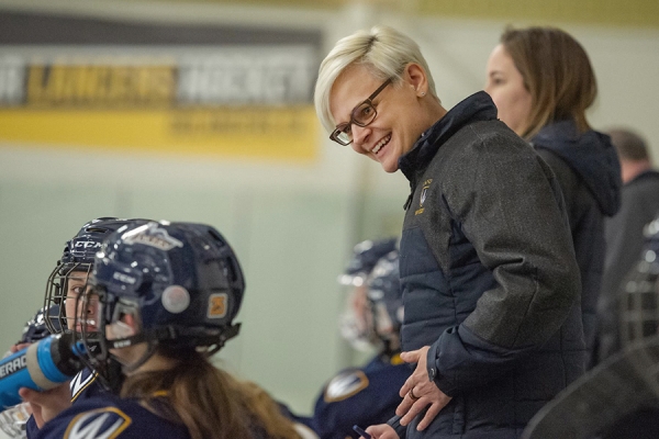 Deanna Iwanicka behind bench
