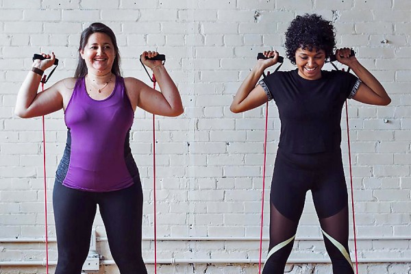 women working out with strong bands