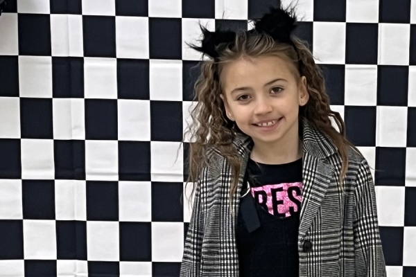 Eight-year-old Zoe Dudzianiec with bow in hair