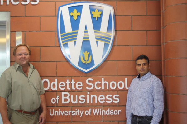 Odette School of Business professors, Dave Bussiere (l.) and Gokul Bhandari (r.) were successful in a Wharton Customer Analytics Initiative (WCAI) competition for access to an extensive database from a major international travel &amp; tourism company. 