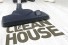 Clean House poster image: Vacuum cleaner sucking up words "The Clean House"