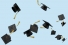 grad caps tossed in air