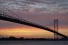 sunset behind bridge