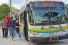students boarding city bus