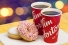 doughnuts and cups of Tim Hortons coffee