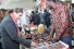 woman admiiring cultural display