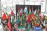 students holding flags of many countries