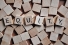 Scrabble tiles spelling the word "equity"