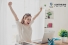 woman excited to be learning at her own pace.
