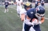 football players - Lancer tackling Varsity Blue