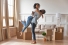 couple hugging in room being moved in