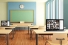 Classroom with laptops on desks