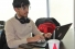 Karm Joshi types on computer