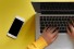 hands on laptop computer keyboard