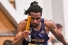 runner holding baton
