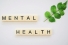 letter tiles spelling "mental health"
