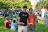 students giving thumbs-up to barbecue food