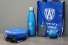 water bottle, lunch box, sunglasses, stress ball, RFID blocking wallet, and reusable carrying bag 