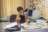 Linda Ruccolo sitting at desk