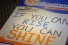 hand-lettered sign: "If you can rise, you can shine"