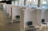 Interior of Windsor Hall showing individual cubicles for administering vaccines in its lobby.