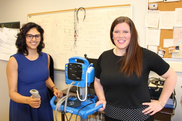 Research assistants Yasina Somani (l.) and Kristin Mayrand&#039;s (r.) seek people with high blood pressure for study.