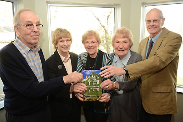 The editors of a book of UWindsor reminiscences celebrate its official launch Friday.
