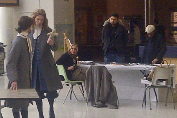 Members of the cast of “The Crucible” enact a scene in the CAW Student Centre