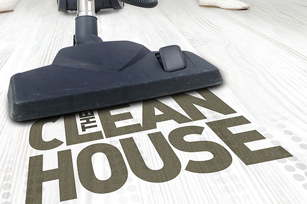 Clean House poster image: Vacuum cleaner sucking up words &quot;The Clean House&quot;