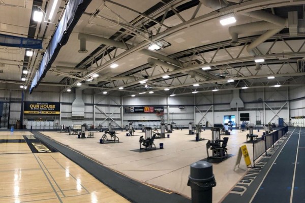 fieldhouse showing exercise equipment spaced apart