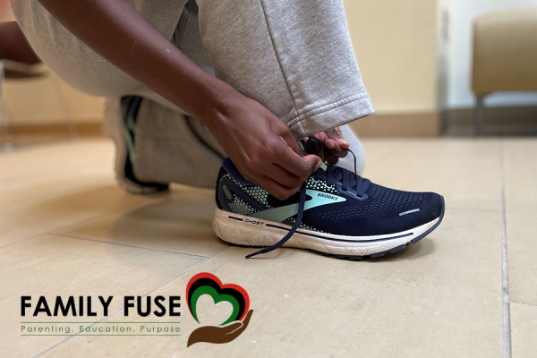 woman tying shoelaces