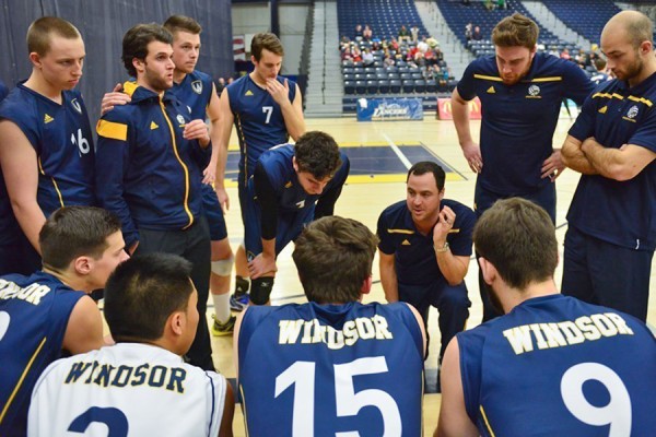 James Gravelle coaching volleyball players