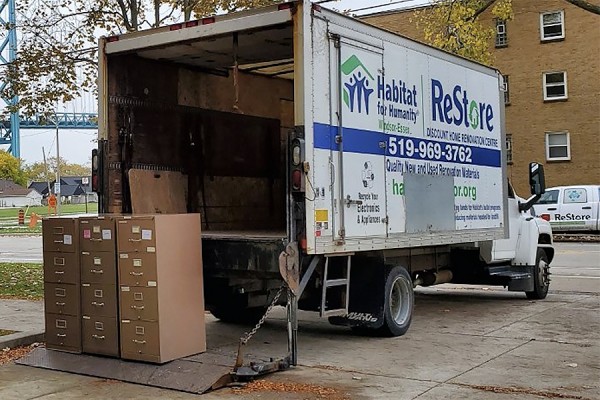 Habitat for Humanity truck loading filing cabinets