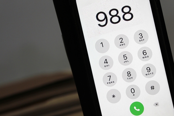 phone displaying outgoing call to 9-8-8