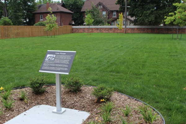 A commemorative plaque marking the former site of Iona College at 208 Sunset Avenue.