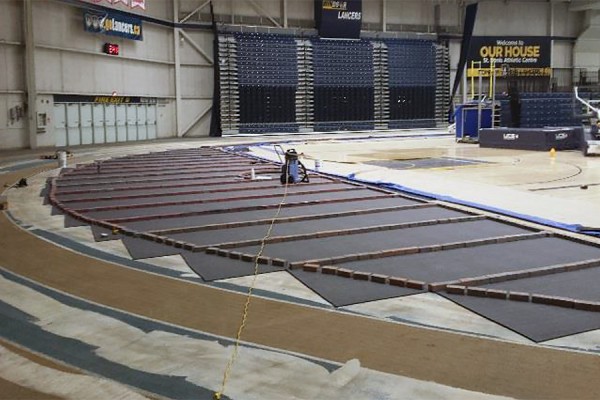 Brick pavers secure the new surface during the replacement of flooring in the Dennis Fairall Fieldhouse.