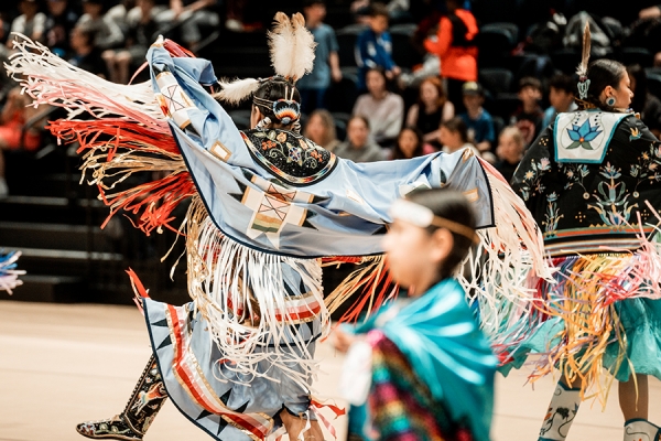 dancer in full regalia at powwow