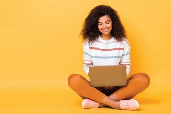 young woman using laptop computer