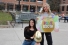 Alex Whatmore and Rachel Coté holding large golden egg