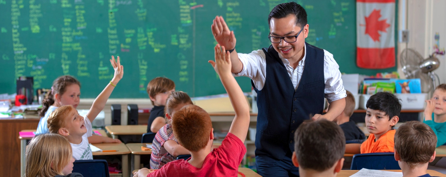 Teacher candidate in classroom with students