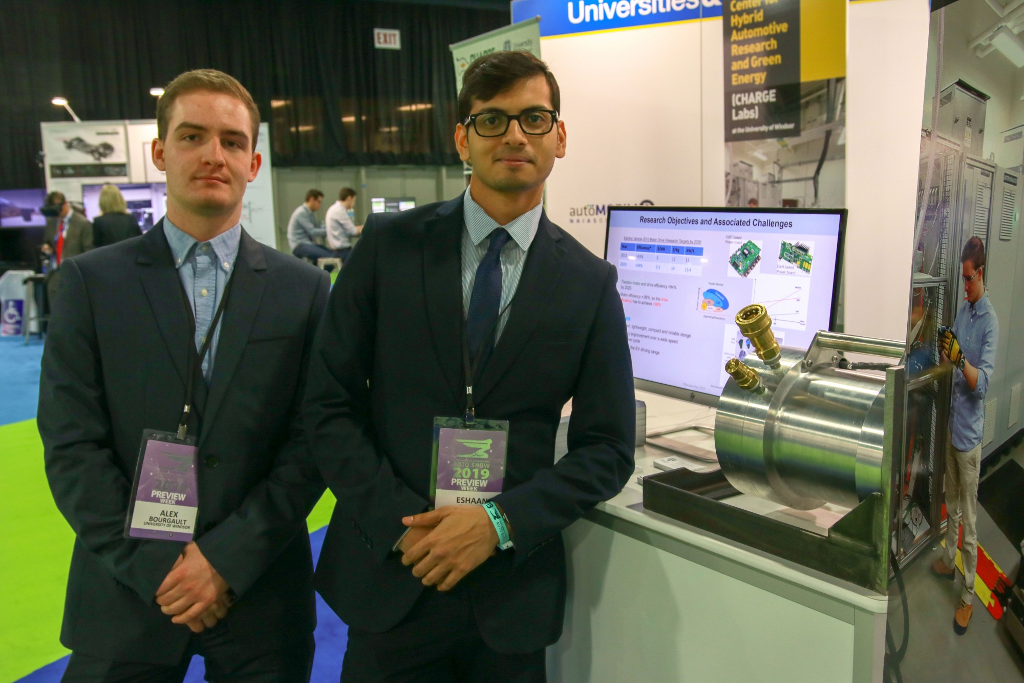 Engineering students in the Auto show exhibit