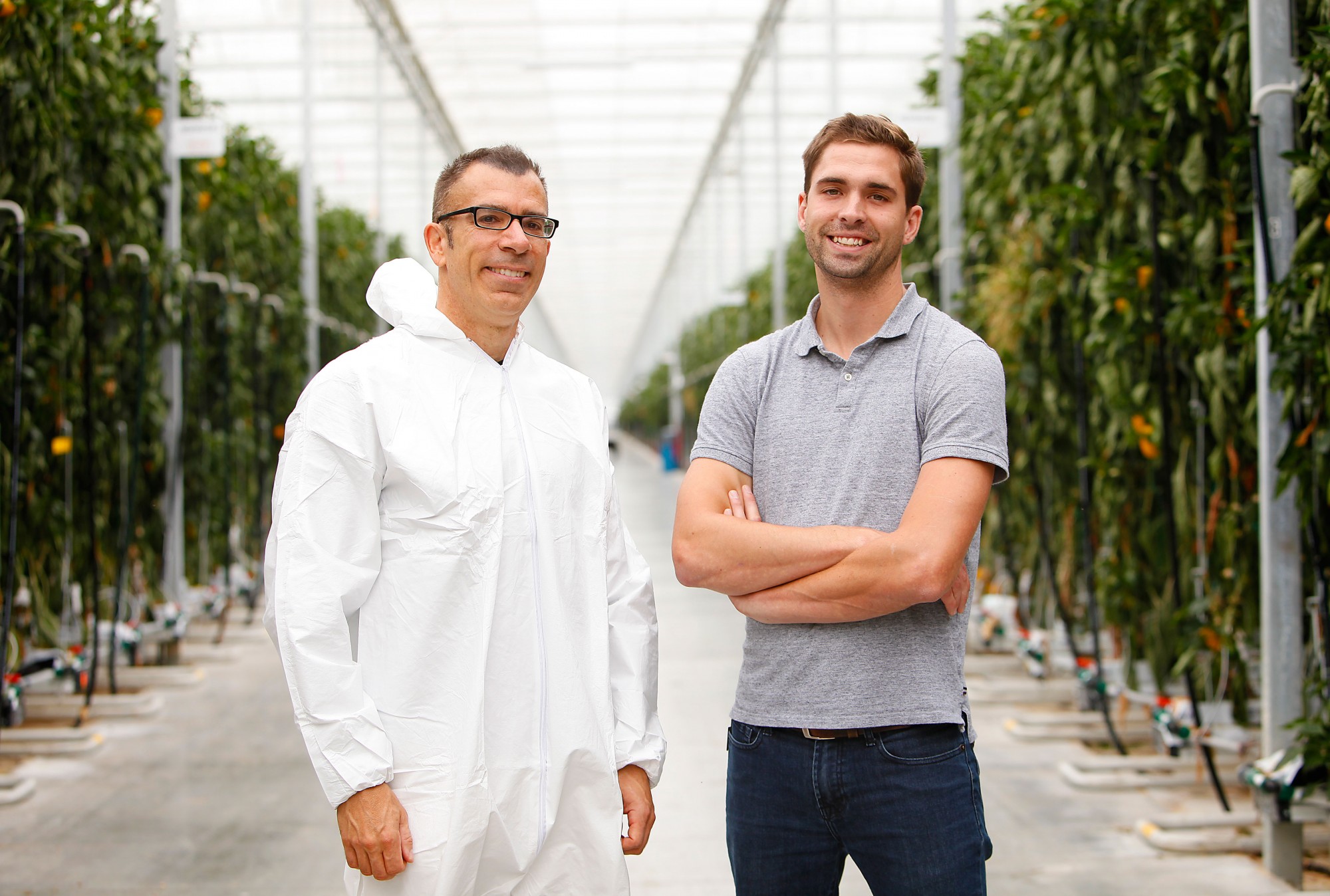 Dr. Rupp Carriveau (L) and Lucas Semple (R) are pictured at an Under Sun Acres greenhouse.