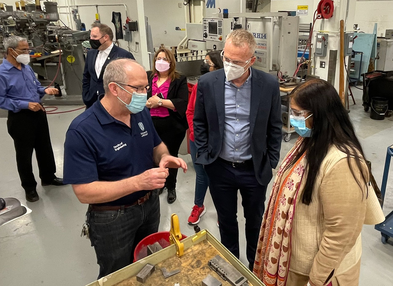 Photo of Mr. Andrew Jenner, Dr. Bill Van Heyst and Ms. Apoorva Srivastava touring Centre for Applied Technology and Development