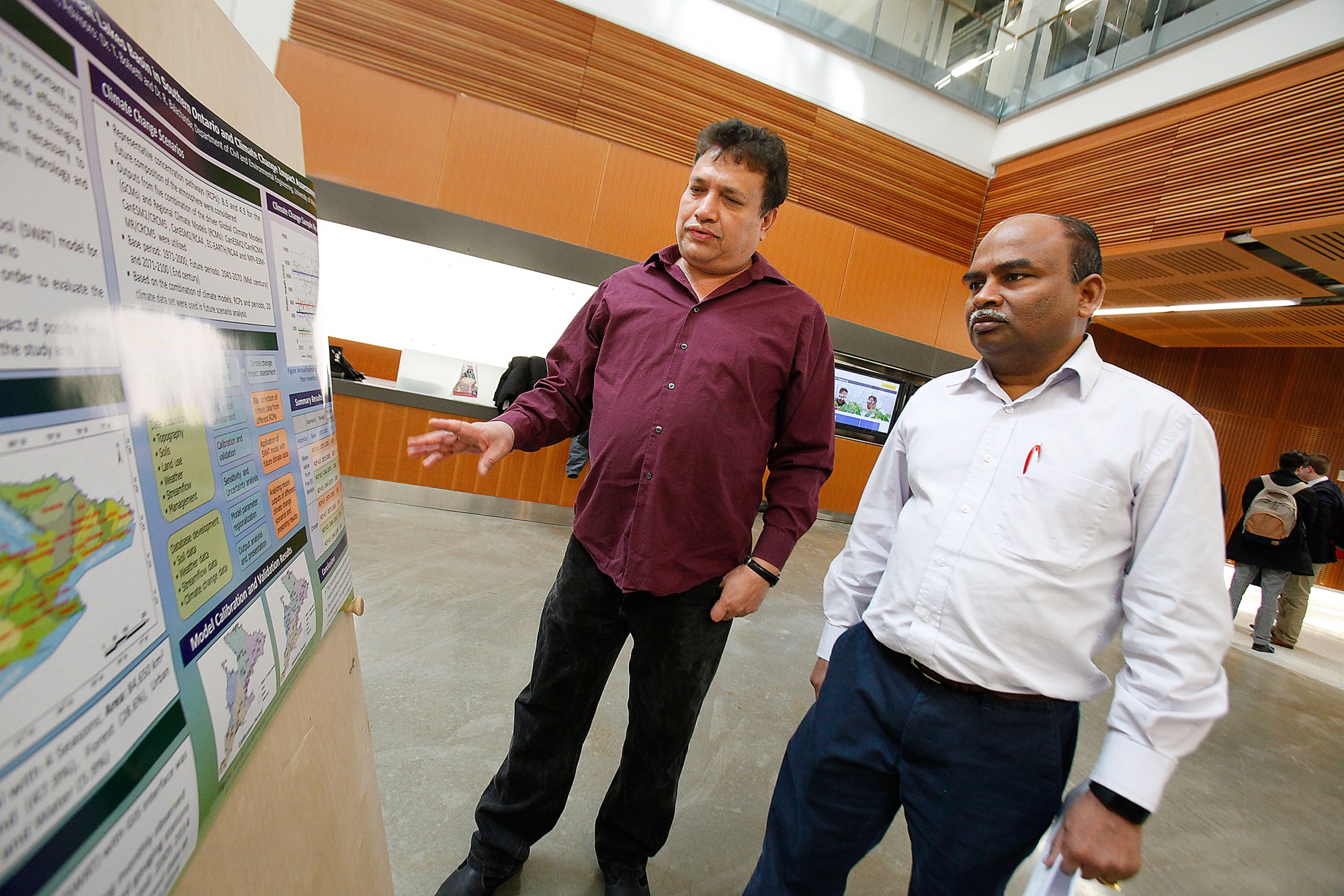 Masihur Rahman (L) and Dr. Tirupati Bolisetti (R) take part in a World Water Day poster presentation